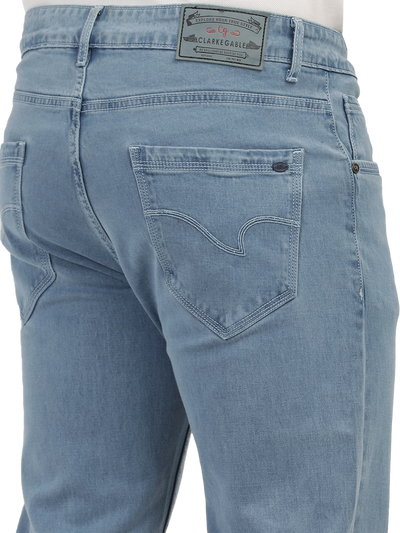 Model wearing Clarke Gable's Polor Ice Blue Smart Fit Jeans in a casual setting