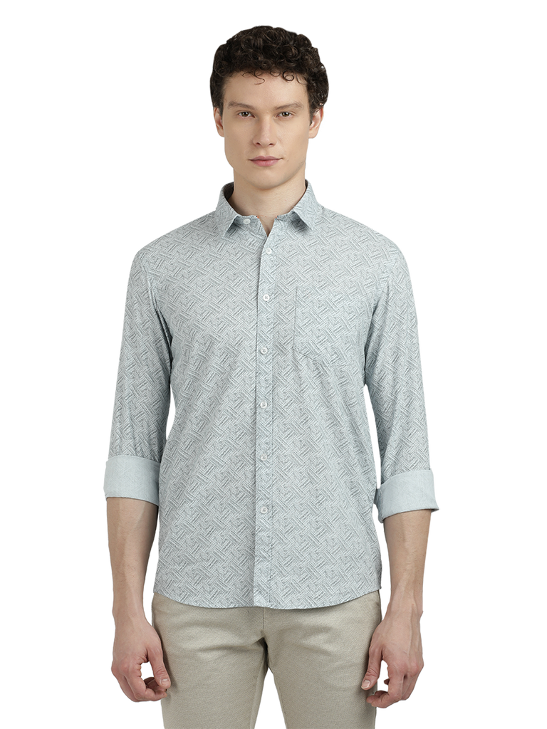 Model wearing Clarke Gable's Sea Blue Printed Semi Casual Shirt in a casual setting