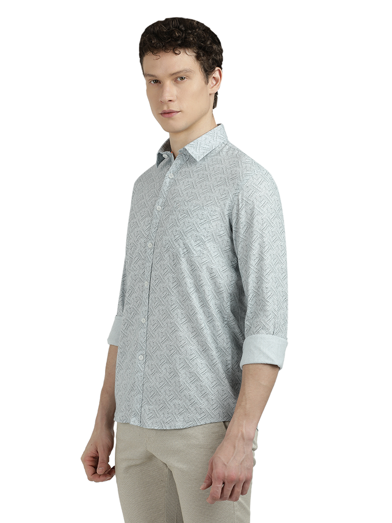 Model wearing Clarke Gable's Sea Blue Printed Semi Casual Shirt in a casual setting