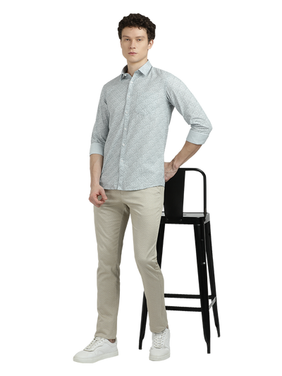 Model wearing Clarke Gable's Sea Blue Printed Semi Casual Shirt in a casual setting