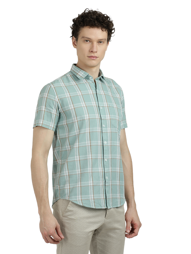 Model wearing Clarke Gable's Sea Blue With White Checked Semi Casual Shirt in a casual setting