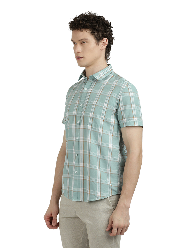 Model wearing Clarke Gable's Sea Blue With White Checked Semi Casual Shirt in a casual setting