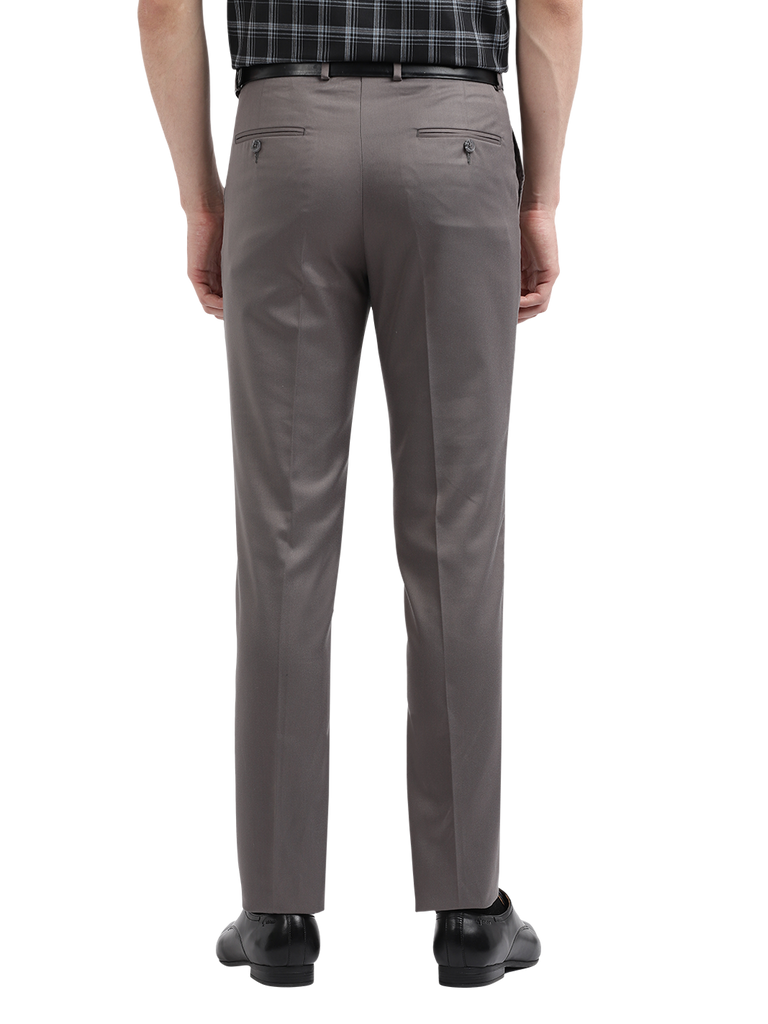 Model wearing Clarke Gable's Silver Grey Sharp Fit Trousers in a casual setting