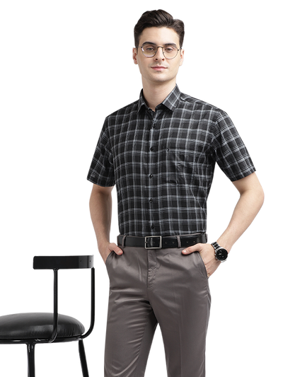 Model wearing Clarke Gable's Silver Grey Sharp Fit Trousers in a casual setting