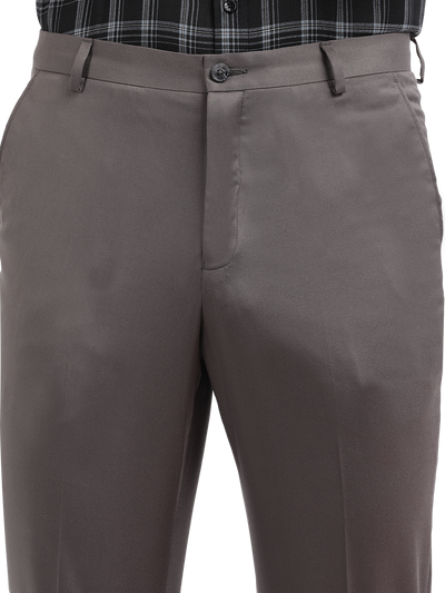 Model wearing Clarke Gable's Silver Grey Sharp Fit Trousers in a casual setting