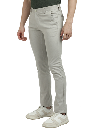 Model wearing Clarke Gable's Silver Trim Fit Trousers in a casual setting