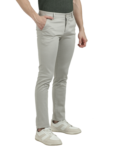 Model wearing Clarke Gable's Silver Trim Fit Trousers in a casual setting