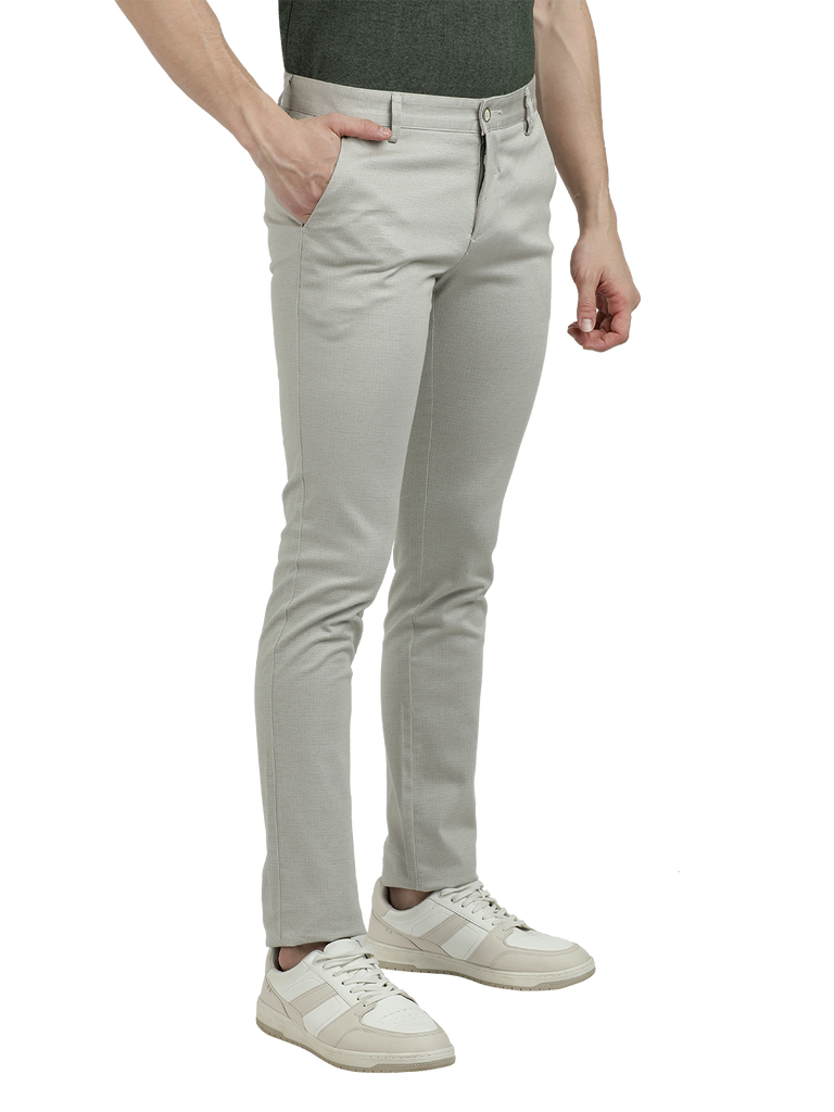 Model wearing Clarke Gable's Silver Trim Fit Trousers in a casual setting