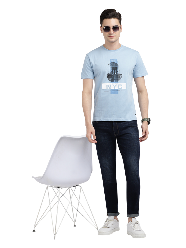 Model wearing Clarke Gable's Sky Blue Printed Crew Neck T-Shirt in a casual setting