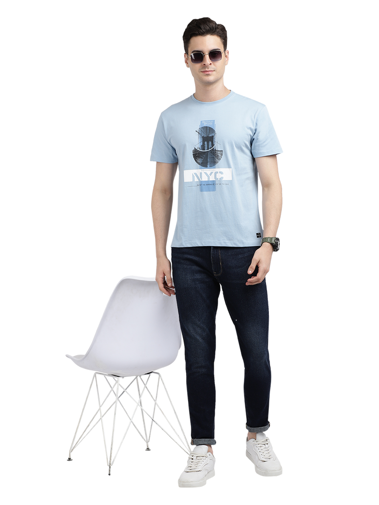 Model wearing Clarke Gable's Sky Blue Printed Crew Neck T-Shirt in a casual setting