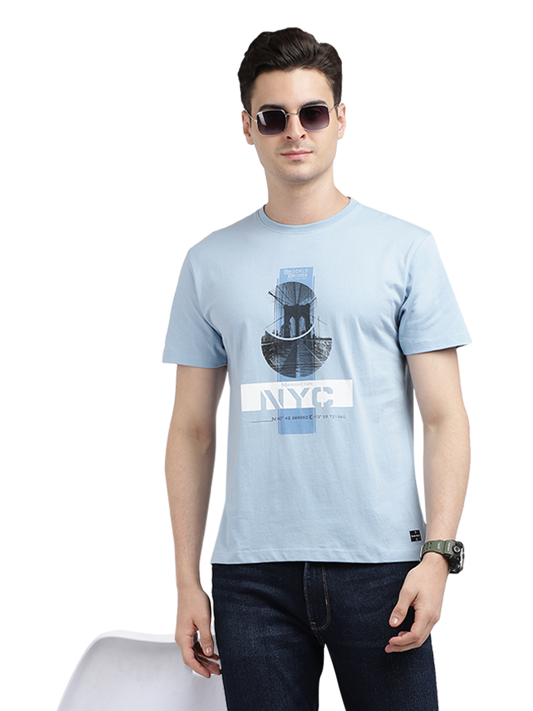 Model wearing Clarke Gable's Sky Blue Printed Crew Neck T-Shirt in a casual setting