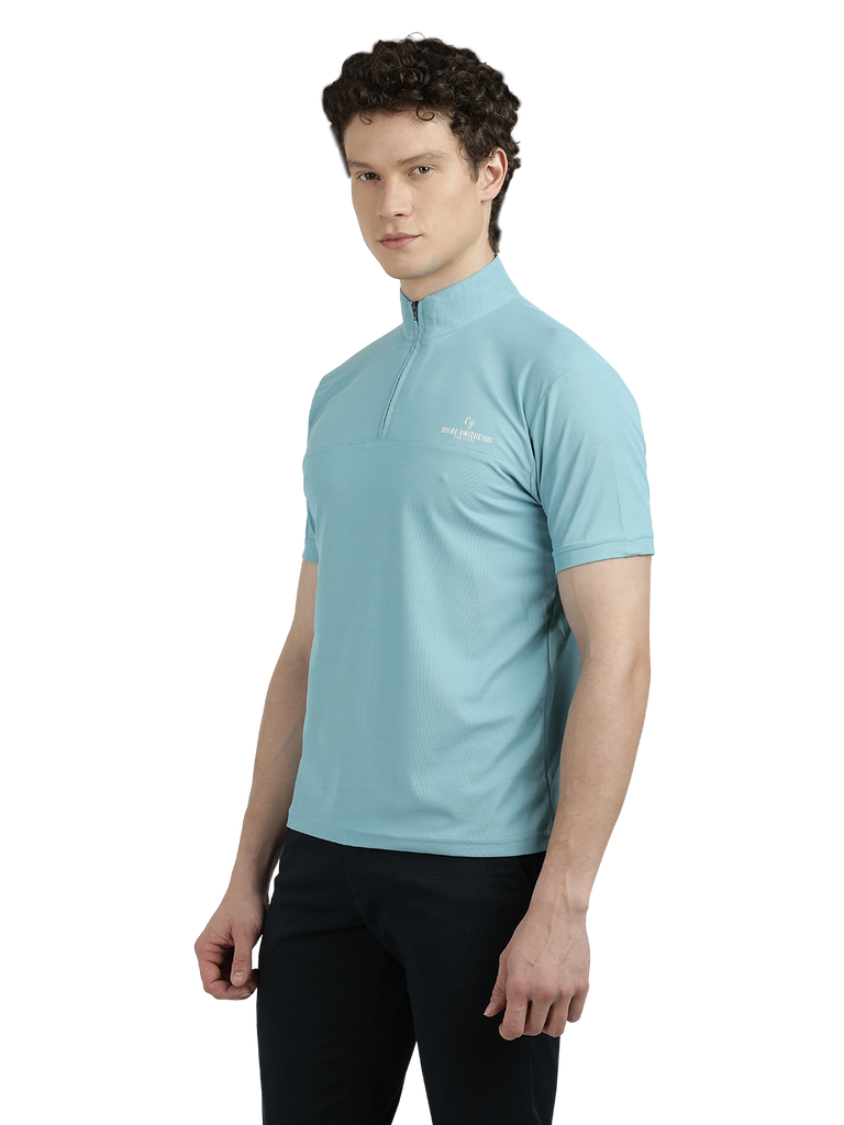 Model wearing Clarke Gable's Sky Blue Solid Turtle Neck T-Shirt in a casual setting