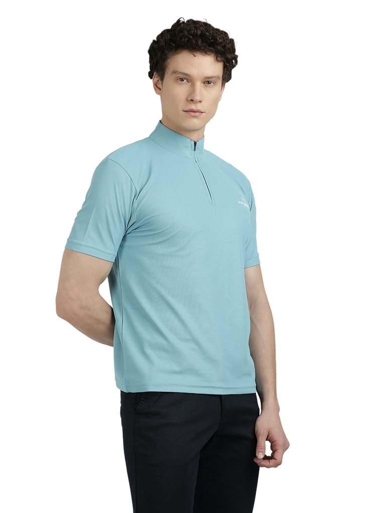 Model wearing Clarke Gable's Sky Blue Solid Turtle Neck T-Shirt in a casual setting