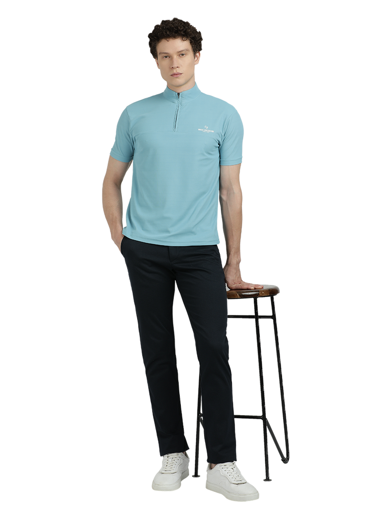 Model wearing Clarke Gable's Sky Blue Solid Turtle Neck T-Shirt in a casual setting