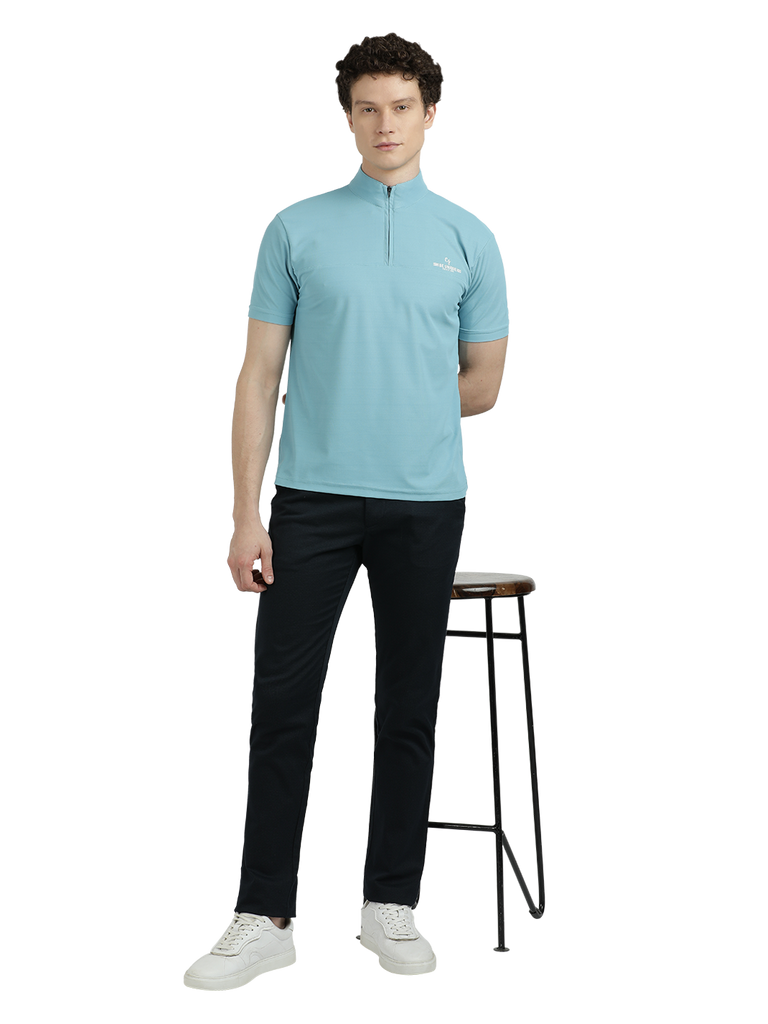 Model wearing Clarke Gable's Sky Blue Solid Turtle Neck T-Shirt in a casual setting