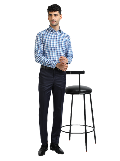 Model wearing Clarke Gable's Sky Blue With White Checked Formal Shirt in a casual setting