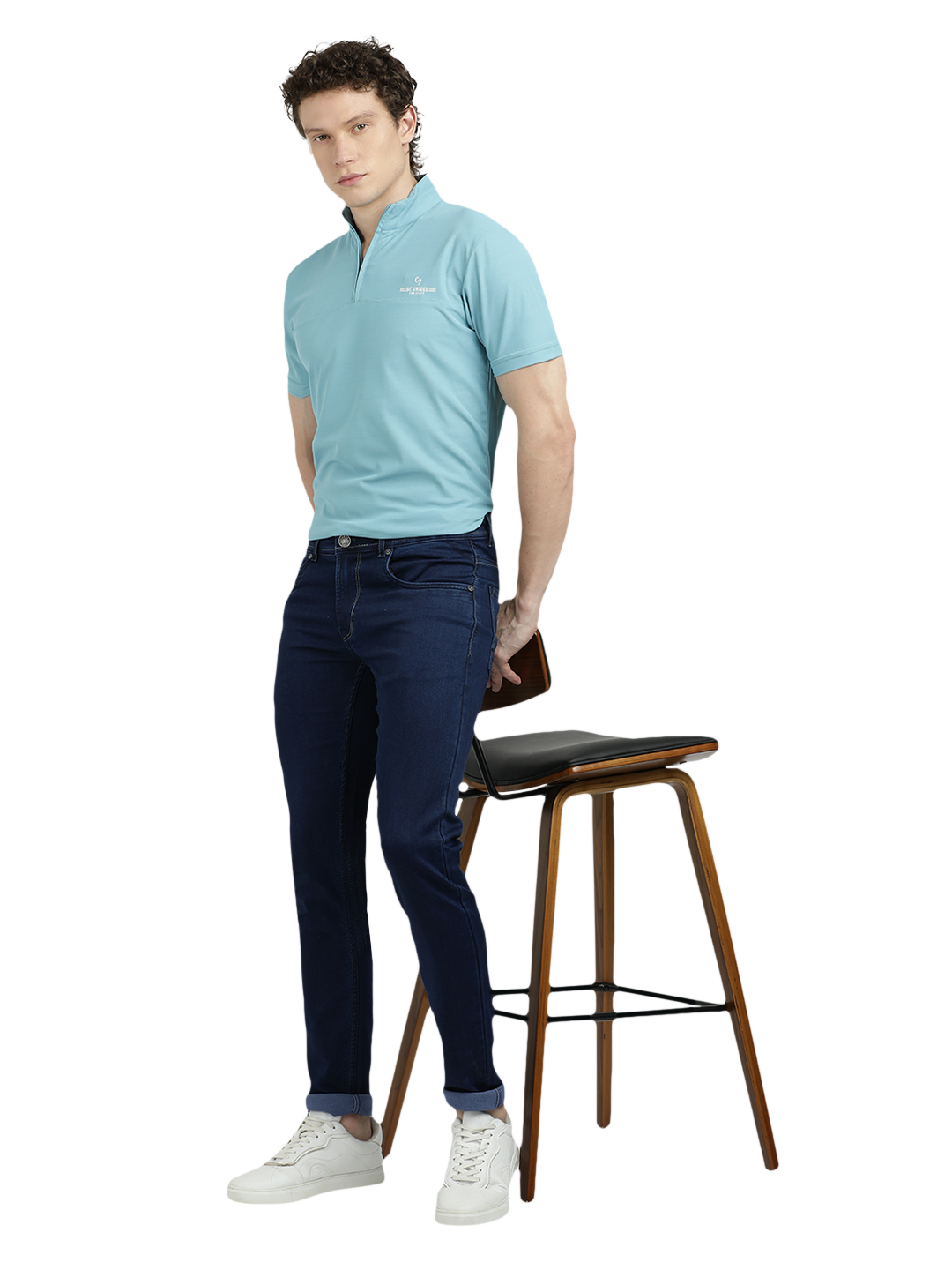 Model wearing Clarke Gable's Solid Dark Blue Skinny Fit Jeans in a casual setting