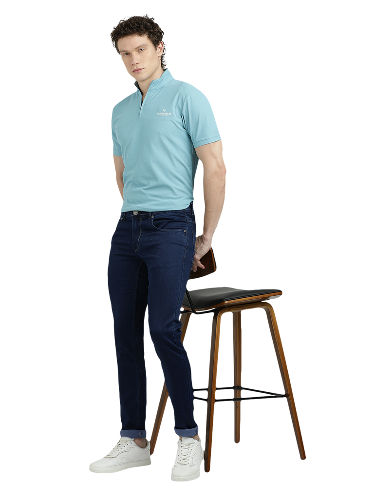 Model wearing Clarke Gable's Solid Dark Blue Skinny Fit Jeans in a casual setting