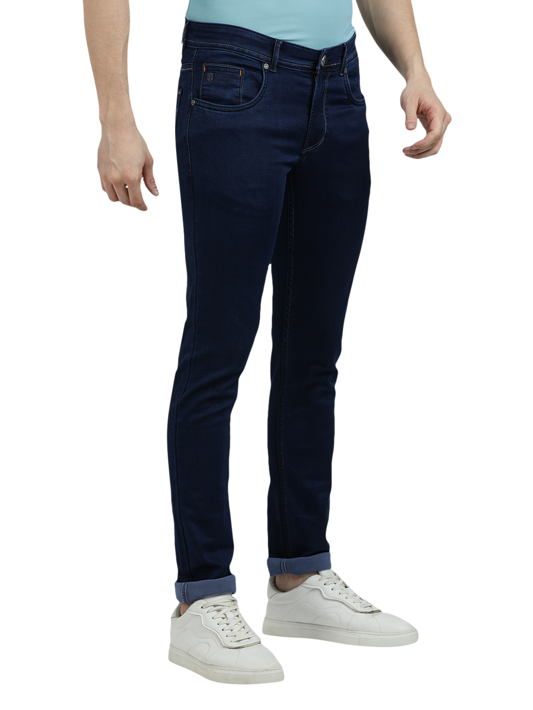 Model wearing Clarke Gable's Solid Dark Blue Skinny Fit Jeans in a casual setting