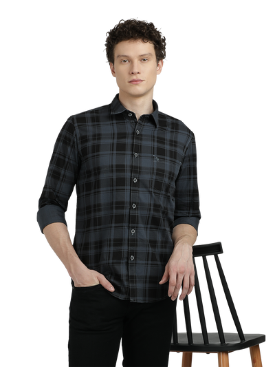 Model wearing Clarke Gable's Steel Grey Checked Semi Casual Shirt in a casual setting