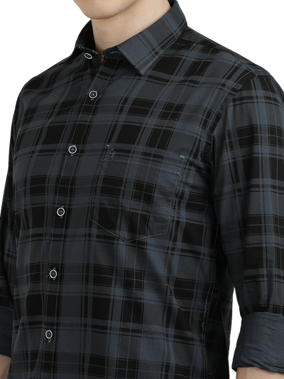 Model wearing Clarke Gable's Steel Grey Checked Semi Casual Shirt in a casual setting