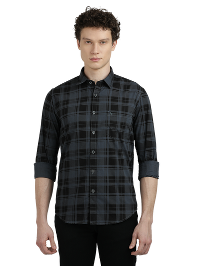Model wearing Clarke Gable's Steel Grey Checked Semi Casual Shirt in a casual setting