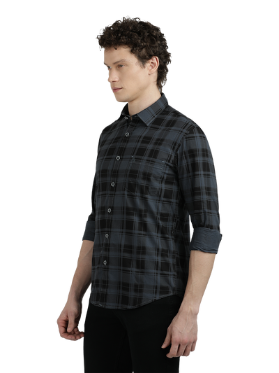 Model wearing Clarke Gable's Steel Grey Checked Semi Casual Shirt in a casual setting