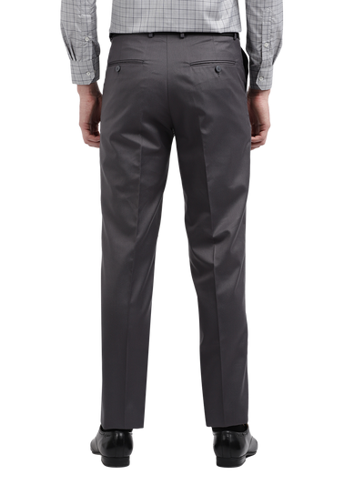 Model wearing Clarke Gable's Steel Grey Smart Fit Trousers in a casual setting