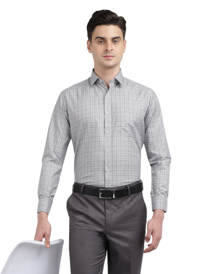 Model wearing Clarke Gable's Steel Grey Smart Fit Trousers in a casual setting