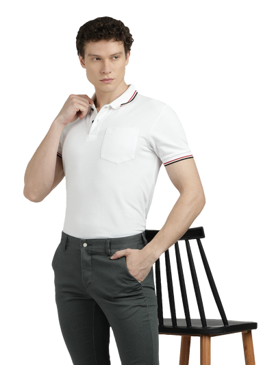 Model wearing Clarke Gable's Steel Grey Trim Fit Trousers in a casual setting