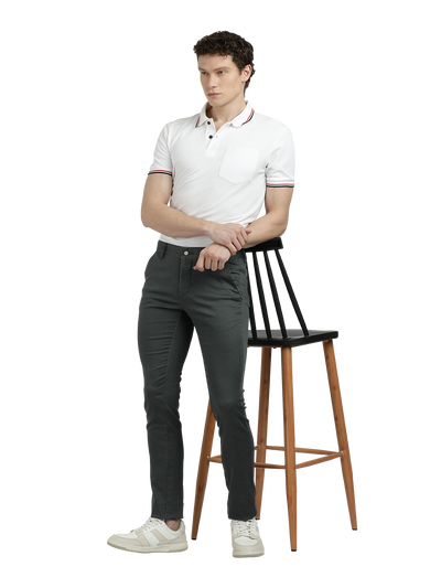 Model wearing Clarke Gable's Steel Grey Trim Fit Trousers in a casual setting