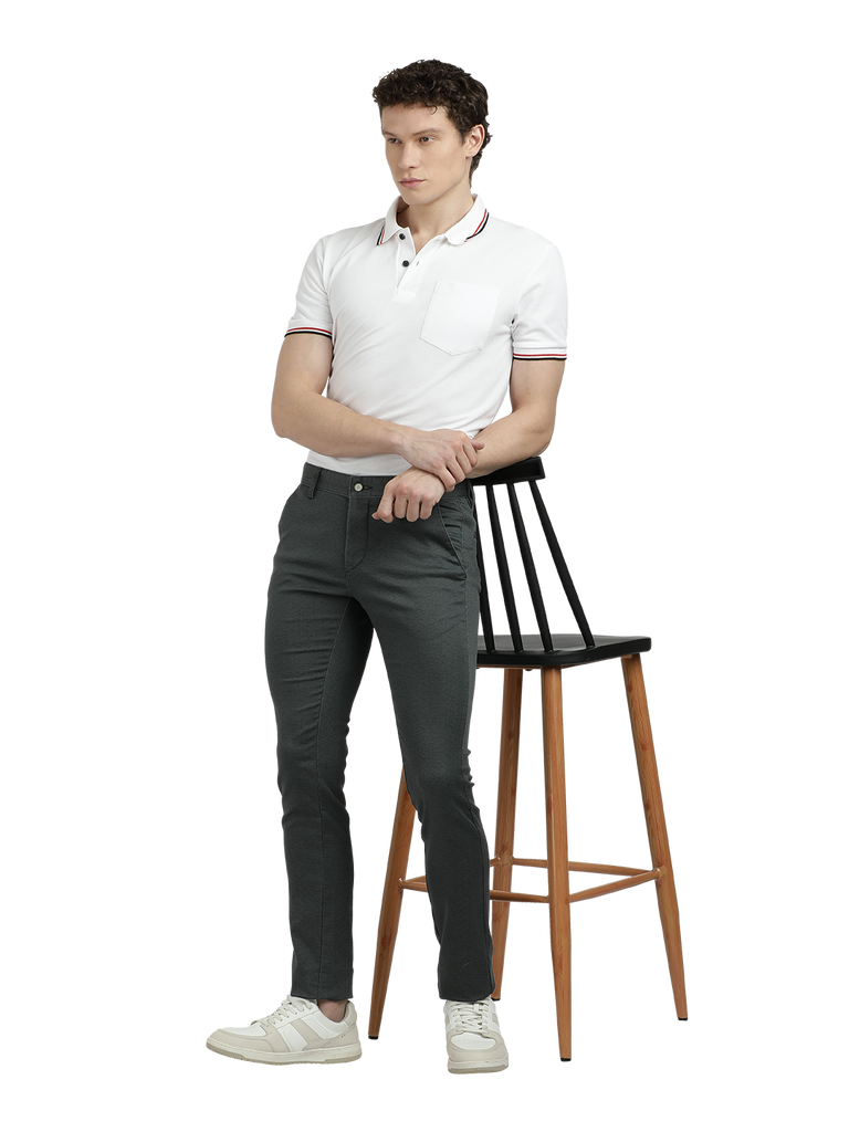 Model wearing Clarke Gable's Steel Grey Trim Fit Trousers in a casual setting