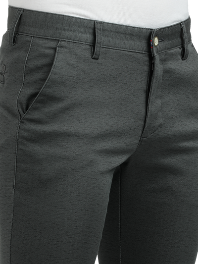 Model wearing Clarke Gable's Steel Grey Trim Fit Trousers in a casual setting