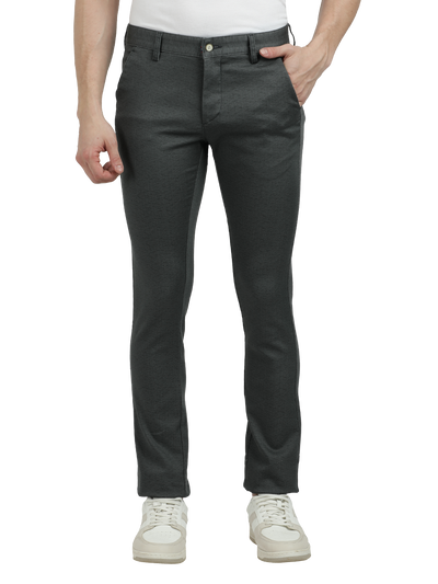 Model wearing Clarke Gable's Steel Grey Trim Fit Trousers in a casual setting