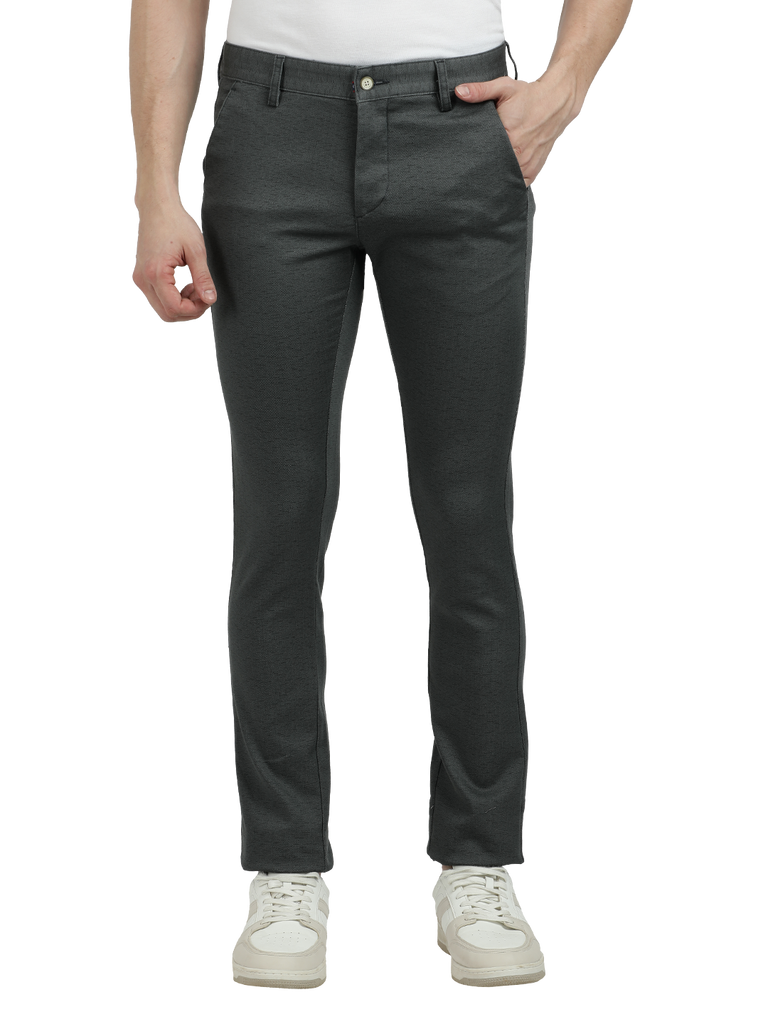 Model wearing Clarke Gable's Steel Grey Trim Fit Trousers in a casual setting