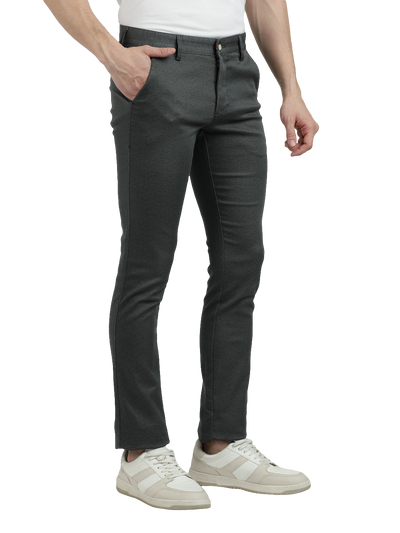 Model wearing Clarke Gable's Steel Grey Trim Fit Trousers in a casual setting