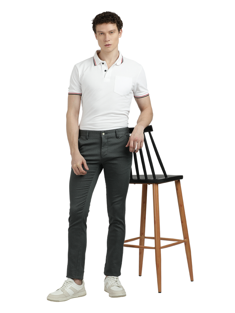 Model wearing Clarke Gable's Steel Grey Trim Fit Trousers in a casual setting