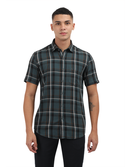 Model wearing Clarke Gable's Teal Blue Checked Semi Casual Shirt in a casual setting