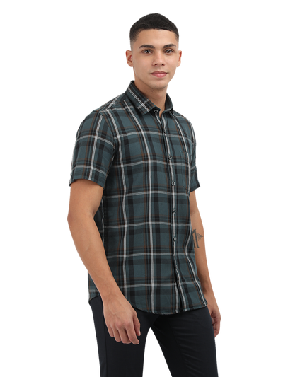 Model wearing Clarke Gable's Teal Blue Checked Semi Casual Shirt in a casual setting