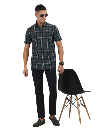 Model wearing Clarke Gable's Teal Blue Checked Semi Casual Shirt in a casual setting