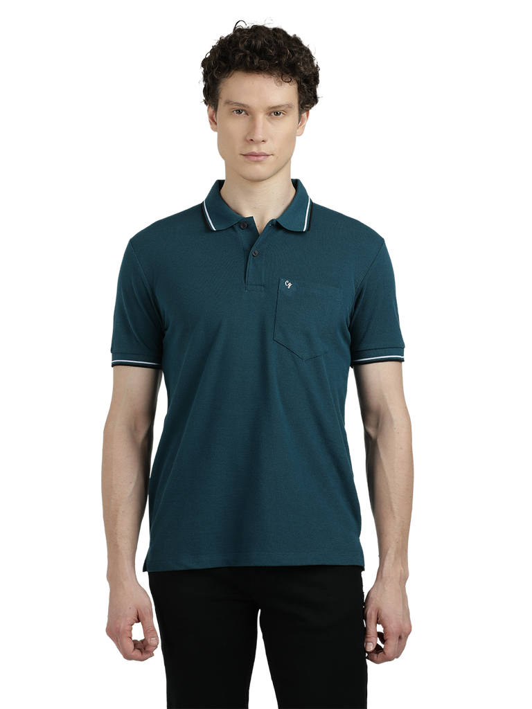 Model wearing Clarke Gable's Teal Blue Solid Polo Collar T-Shirt in a casual setting