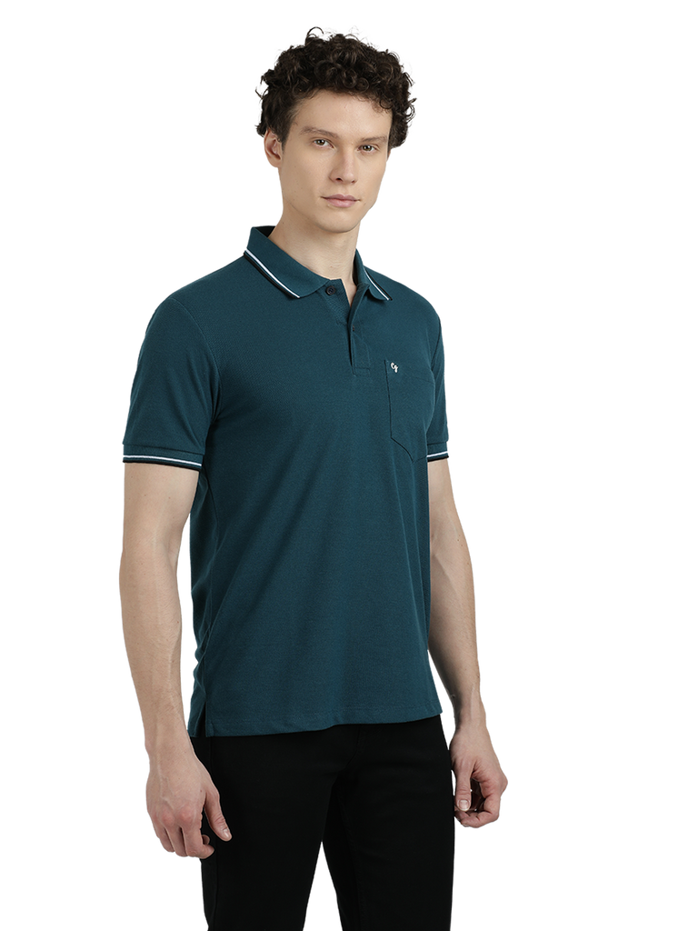 Model wearing Clarke Gable's Teal Blue Solid Polo Collar T-Shirt in a casual setting