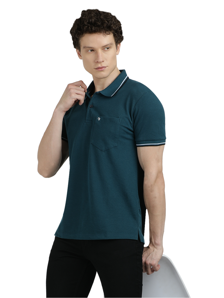 Model wearing Clarke Gable's Teal Blue Solid Polo Collar T-Shirt in a casual setting