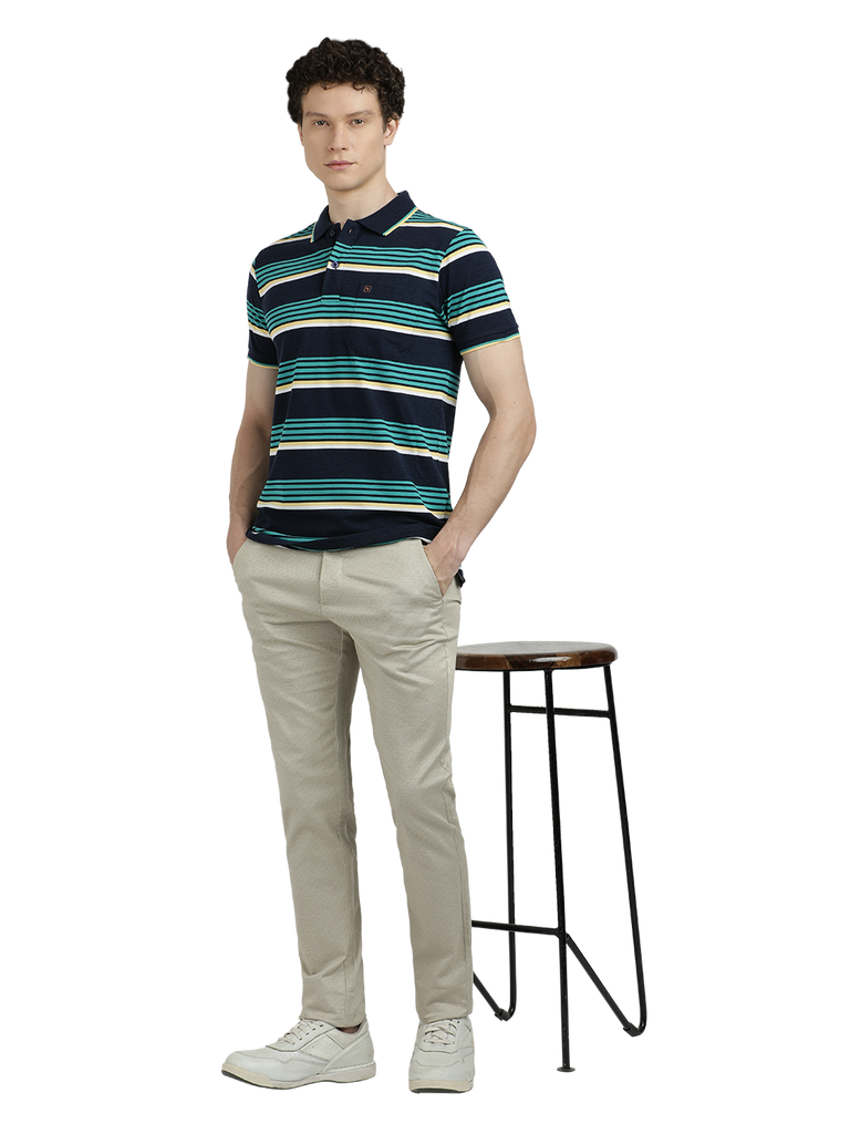 Model wearing Clarke Gable's Teal Blue with Navy Blue Striped Polo Collar T-Shirt in a casual setting
