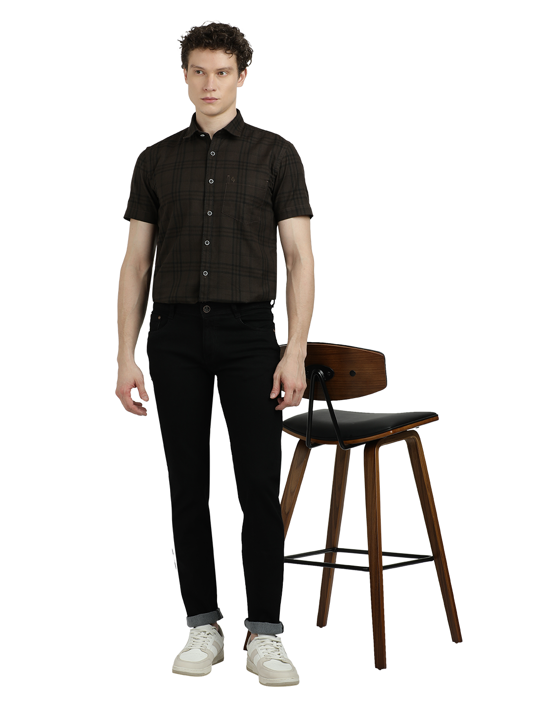 Model wearing Clarke Gable's Ultra Black Slim Fit Jeans in a casual setting