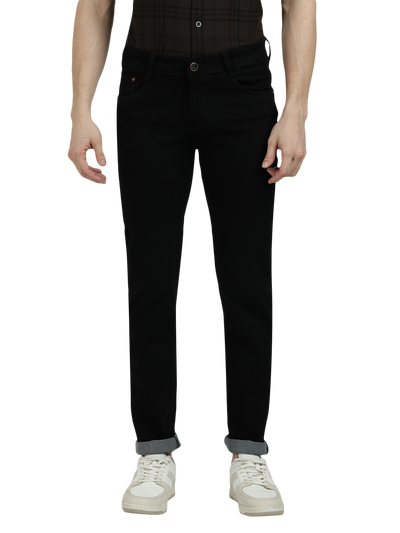 Model wearing Clarke Gable's Ultra Black Slim Fit Jeans in a casual setting