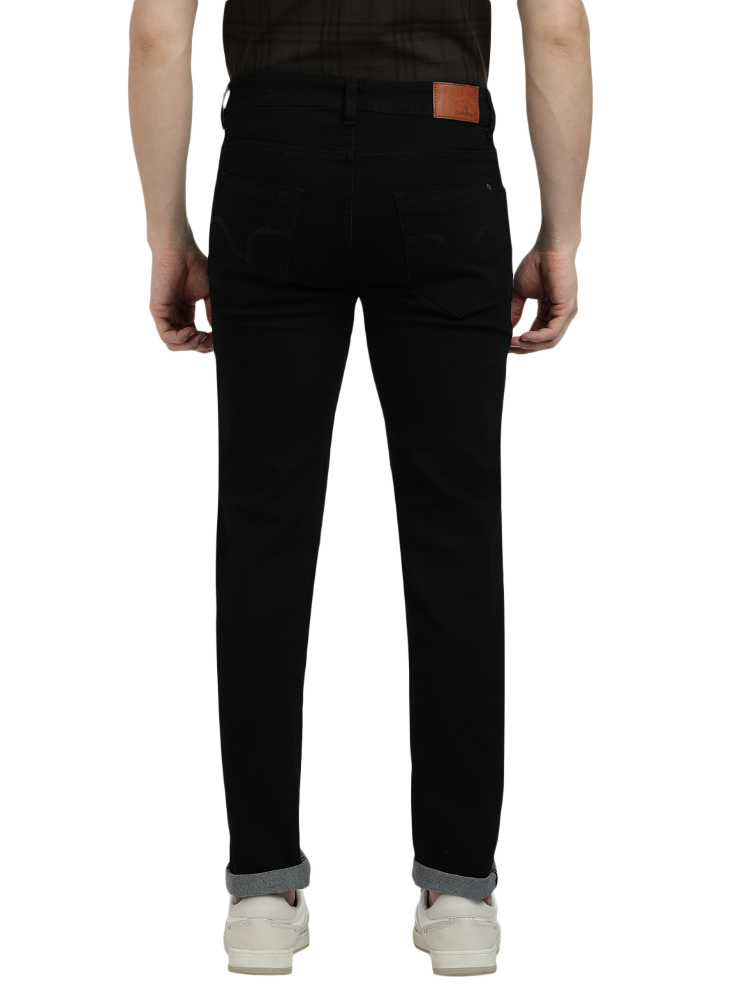Model wearing Clarke Gable's Ultra Black Slim Fit Jeans in a casual setting