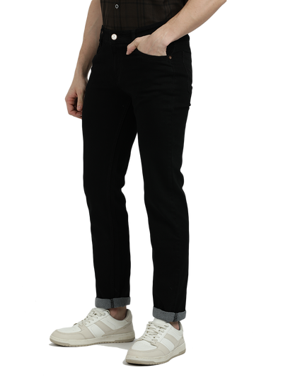 Model wearing Clarke Gable's Ultra Black Slim Fit Jeans in a casual setting