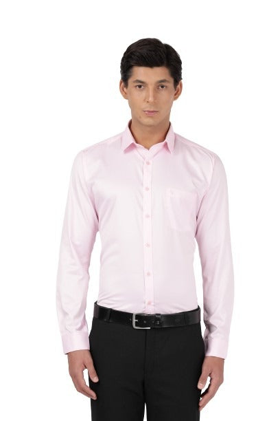 Model dressed in Clarke Gable's Light Pink Plain Relax Fit Shirt in a casual setting