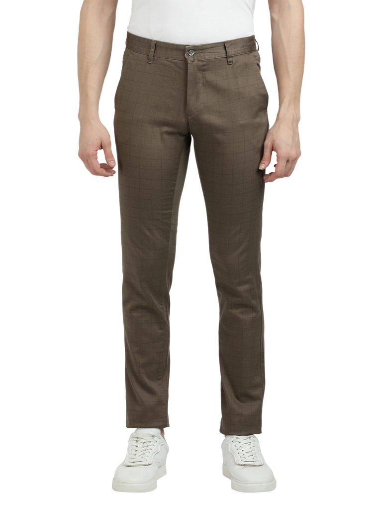 Model wearing Clarke Gable's Warm Grey Trim Fit Trousers in a casual setting